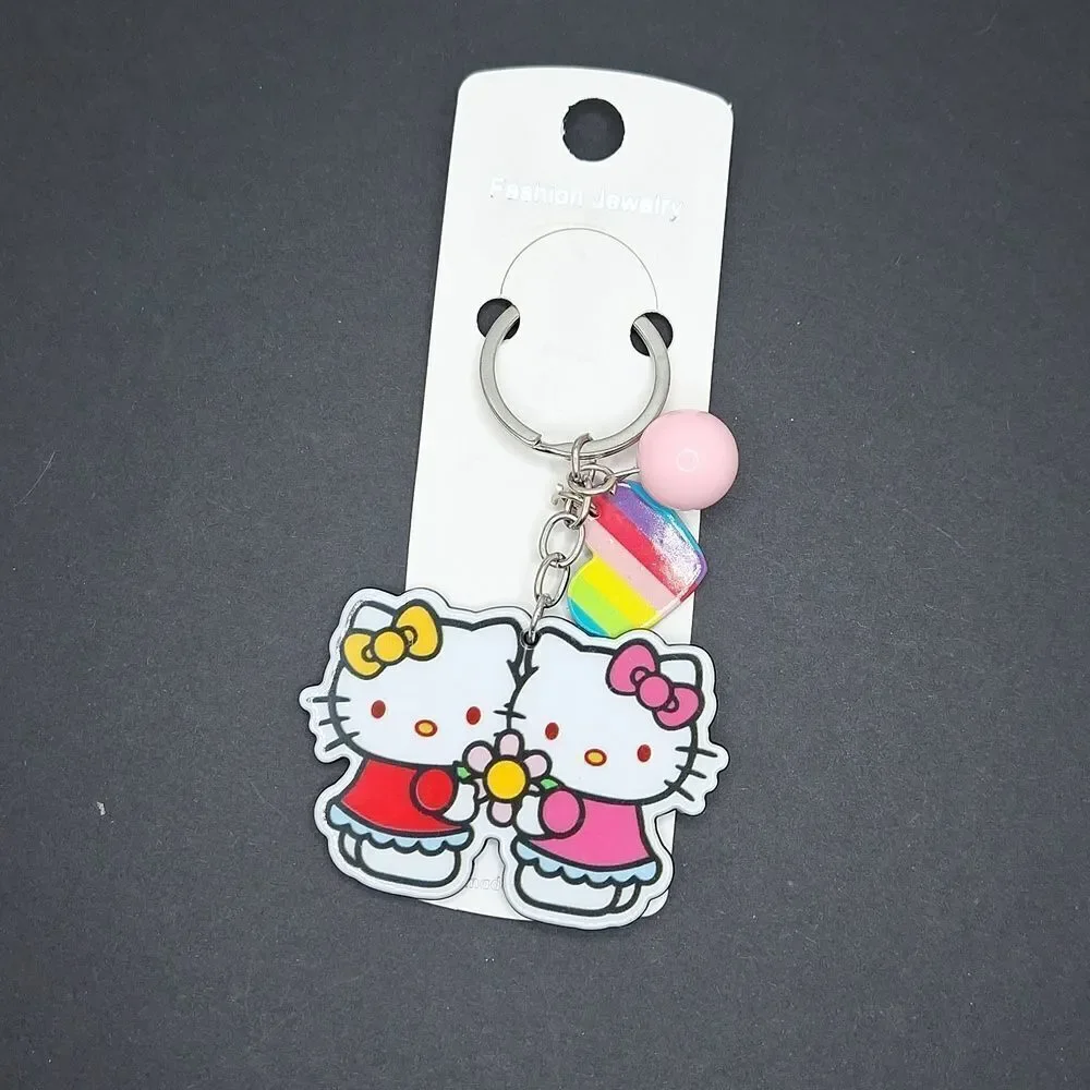 Hello kitty keychain pink bow rainbow heart bead and charm